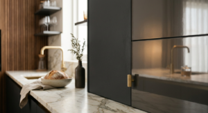 A high-end editorial close-up of a modern kitchen interior, artfully contrasting a sleek high-gloss