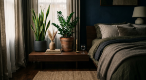 A high-end, editorial-style interior photograph of a cozy, dimly lit bedroom featuring lush, resilie